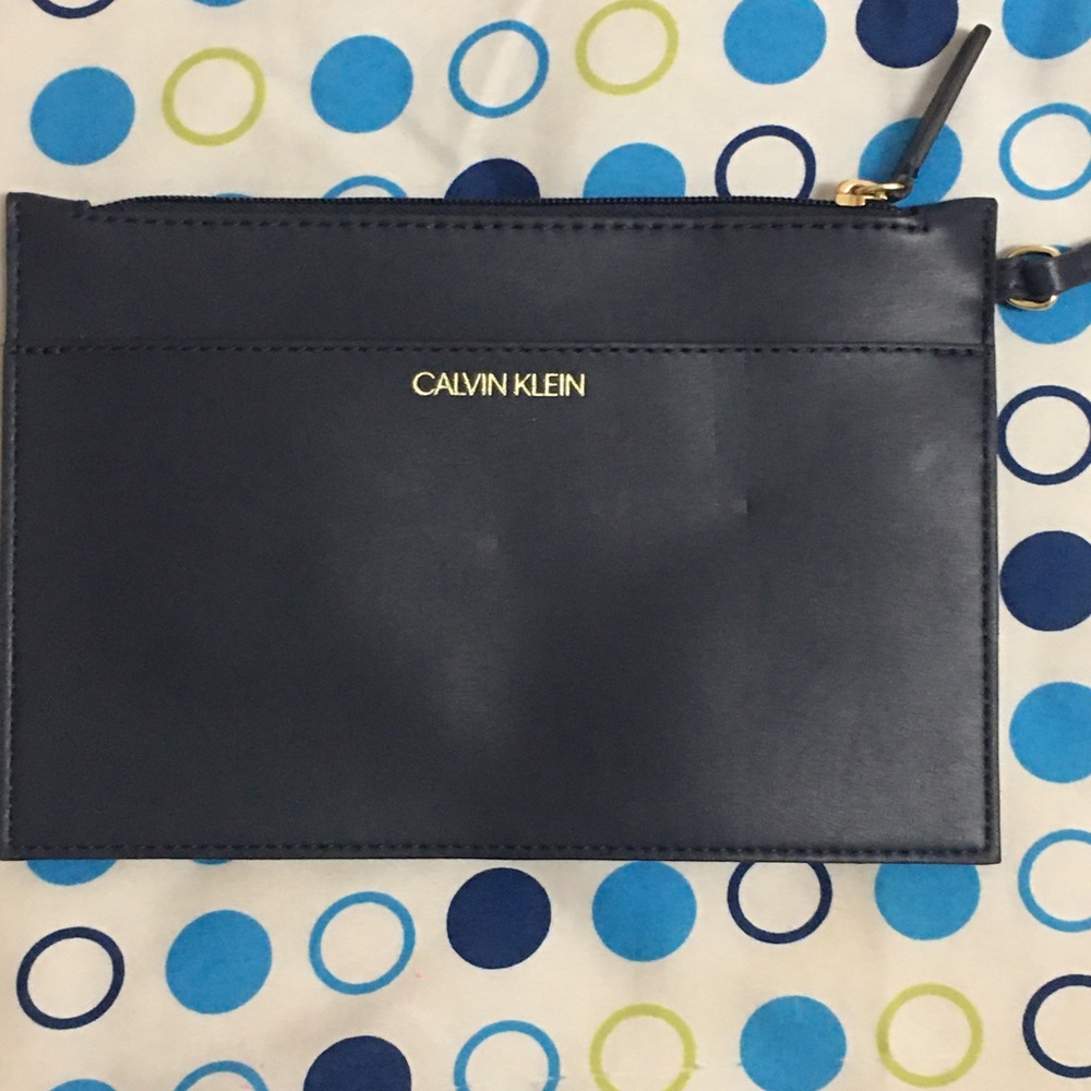 🦋Calvin Klein Black Leather Clutch with Gold Branding⭐️